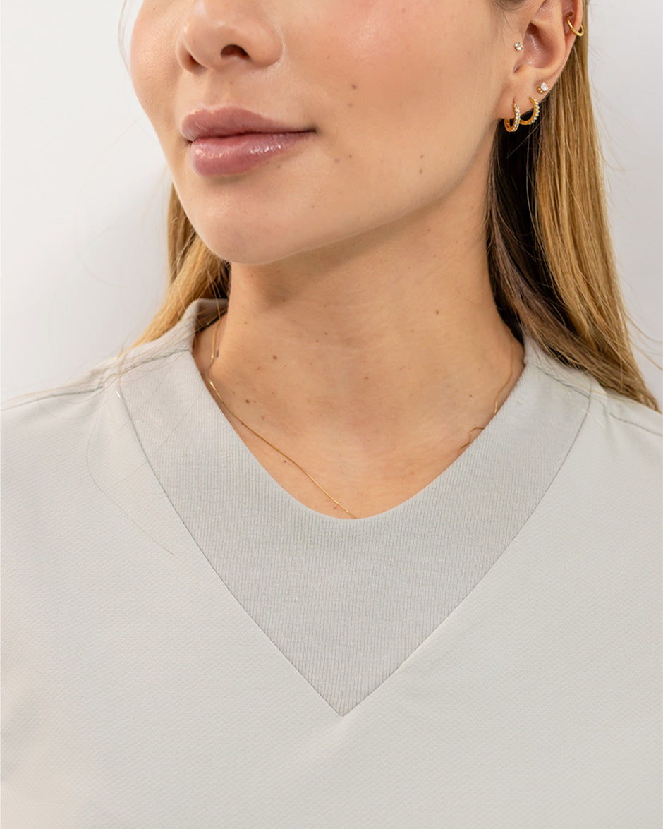 Blusa libra gris arena mujer